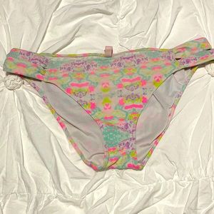 Neon tie dye looking bathing suit bottoms